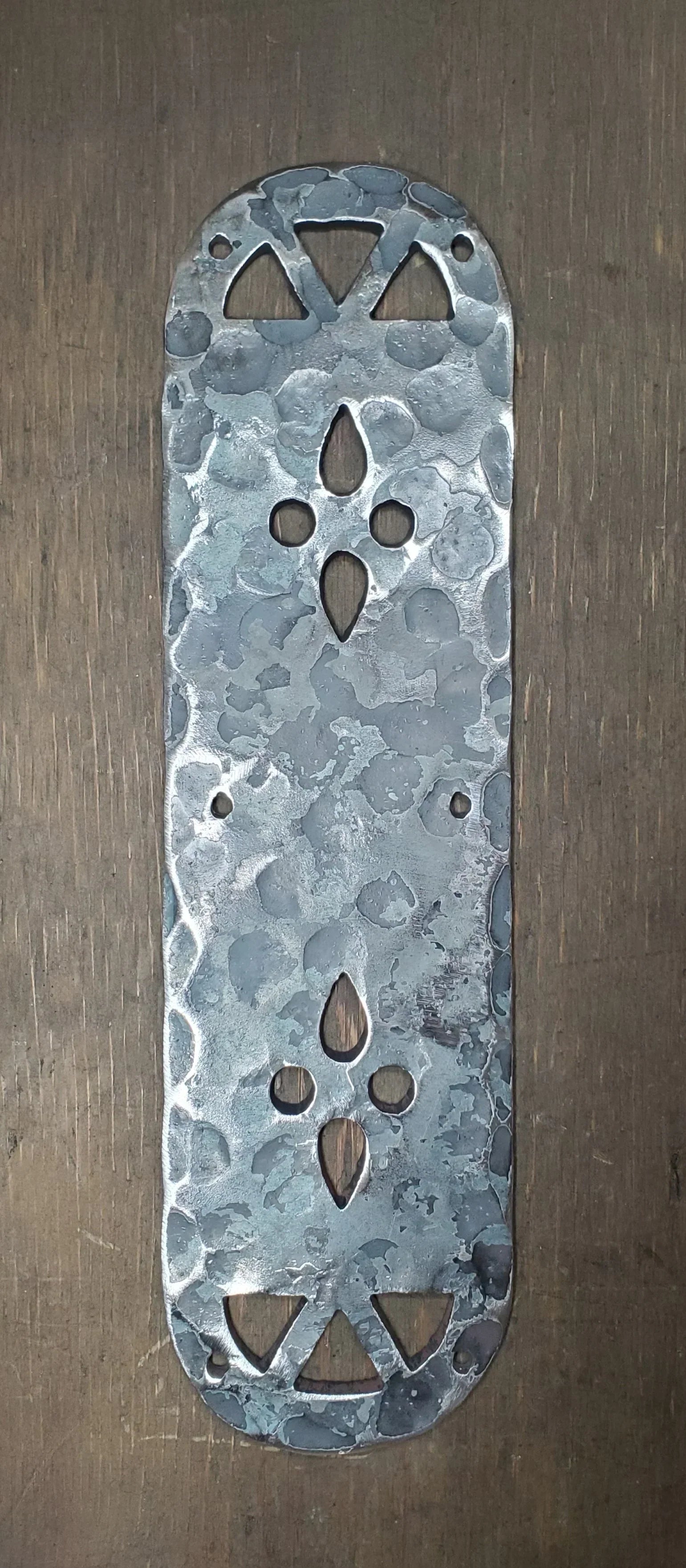 Decorative push plate with unique design enhancing door aesthetics and durability
