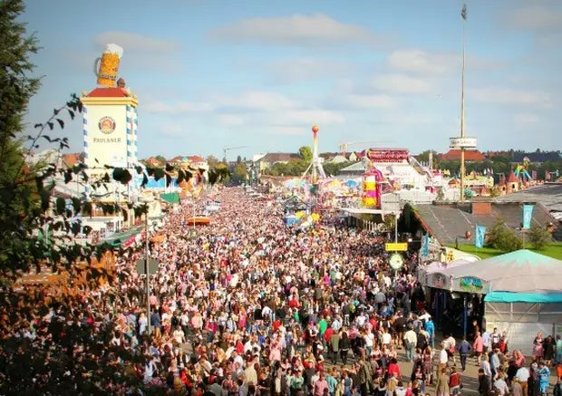 Oktoberfest celebration with a large crowd and festive decorations in Bavaria