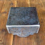 Capuchon de poteau transitionnel en fer