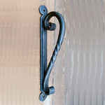 Poignée de porte cuillère