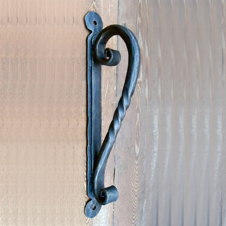 Poignée de porte cuillère