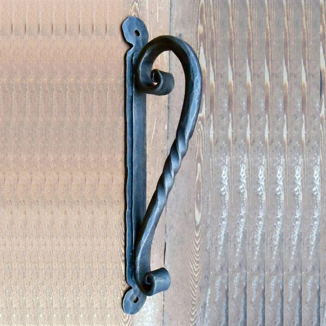 Poignée de porte cuillère