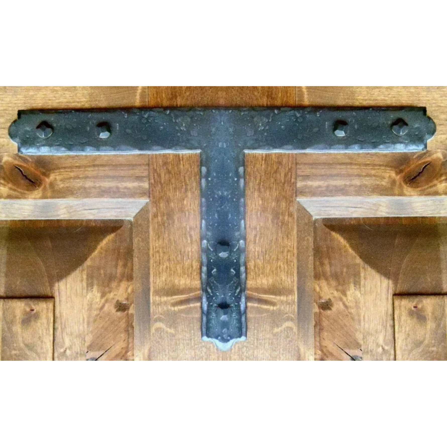 Plaque frontale coloniale en fer T