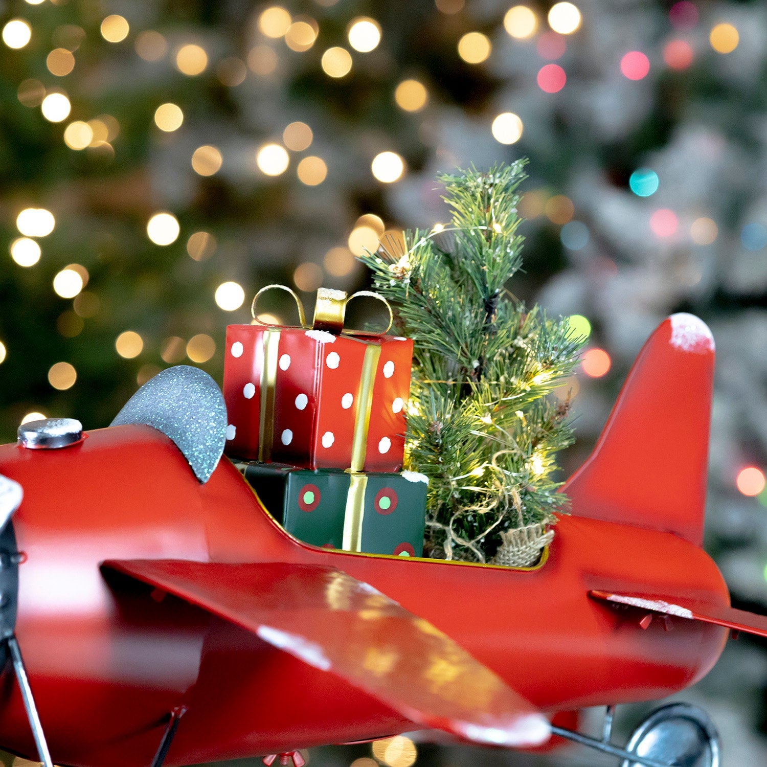 Red Airplane with Lighted Christmas Tree and Gifts Holiday Ornaments Christmas