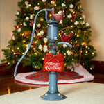 Old Style Water Pump with "Merry Christmas" Sign and Cardinals Holiday Ornaments Christmas
