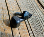  A rustic decorative pyramid head screw, perfect for adding a fancy touch to any project