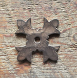 Rondelle de fer fleur de lys babylonienne