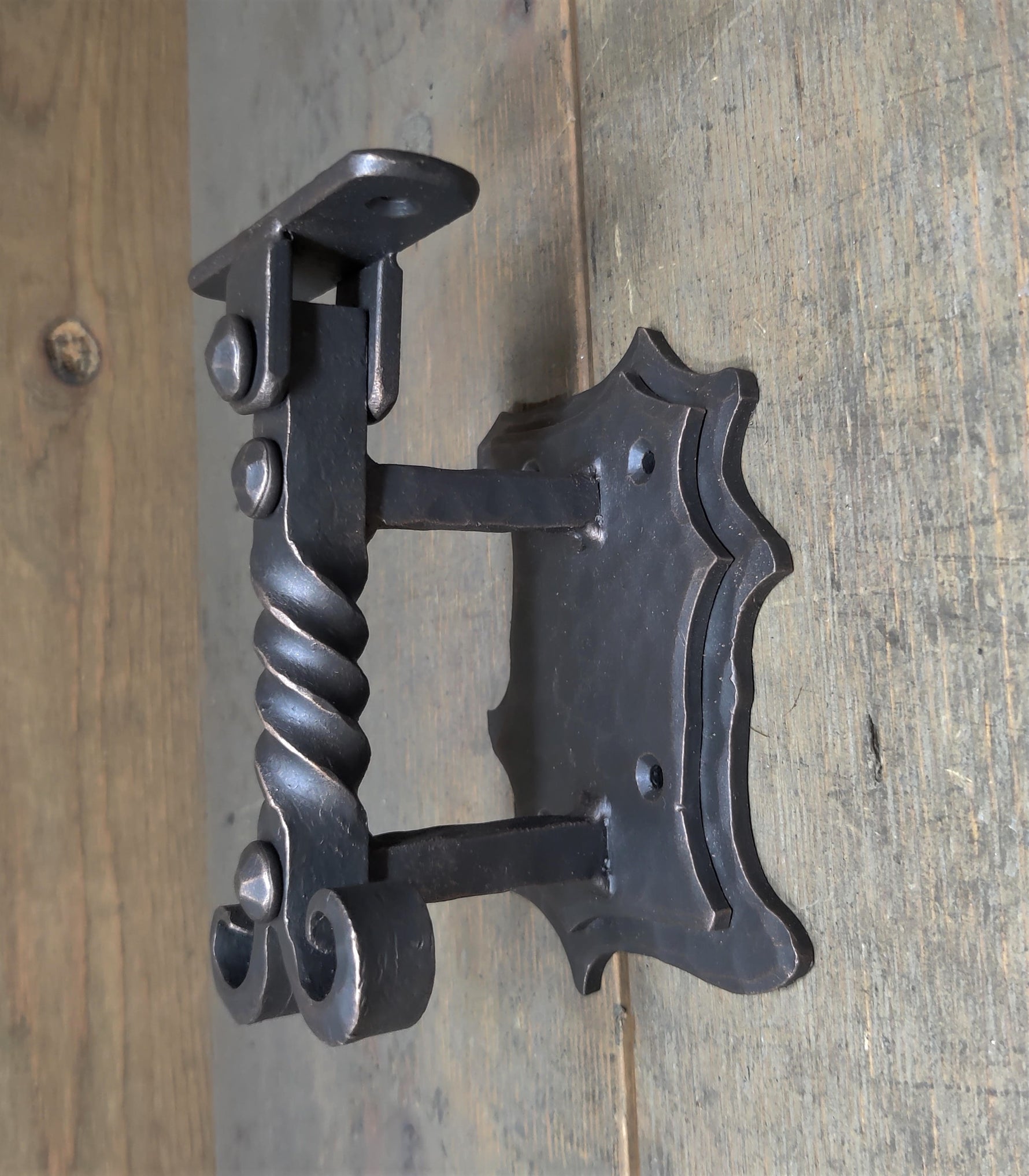 Nordic iron handrail bracket on wood wall