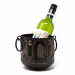 The Curated Nomad Haitia Handmade Hammered Metal Round Container with Handles Decorative Bowls Kitchen Accessory