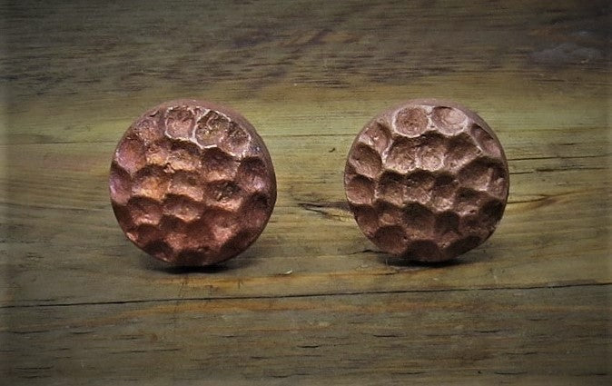 Hammered copper bolt used for rustic decorative design in architectural metalwork